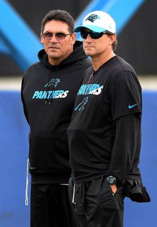 Panther's Head Coach Ron Rivera (Left) & Offensive Coordinator Mike Shula (Right) via charlotteobserver.com