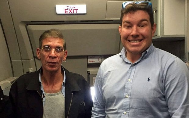 Ben Innes in a photograph alongside the hijacker (PHOTO: Twitter)